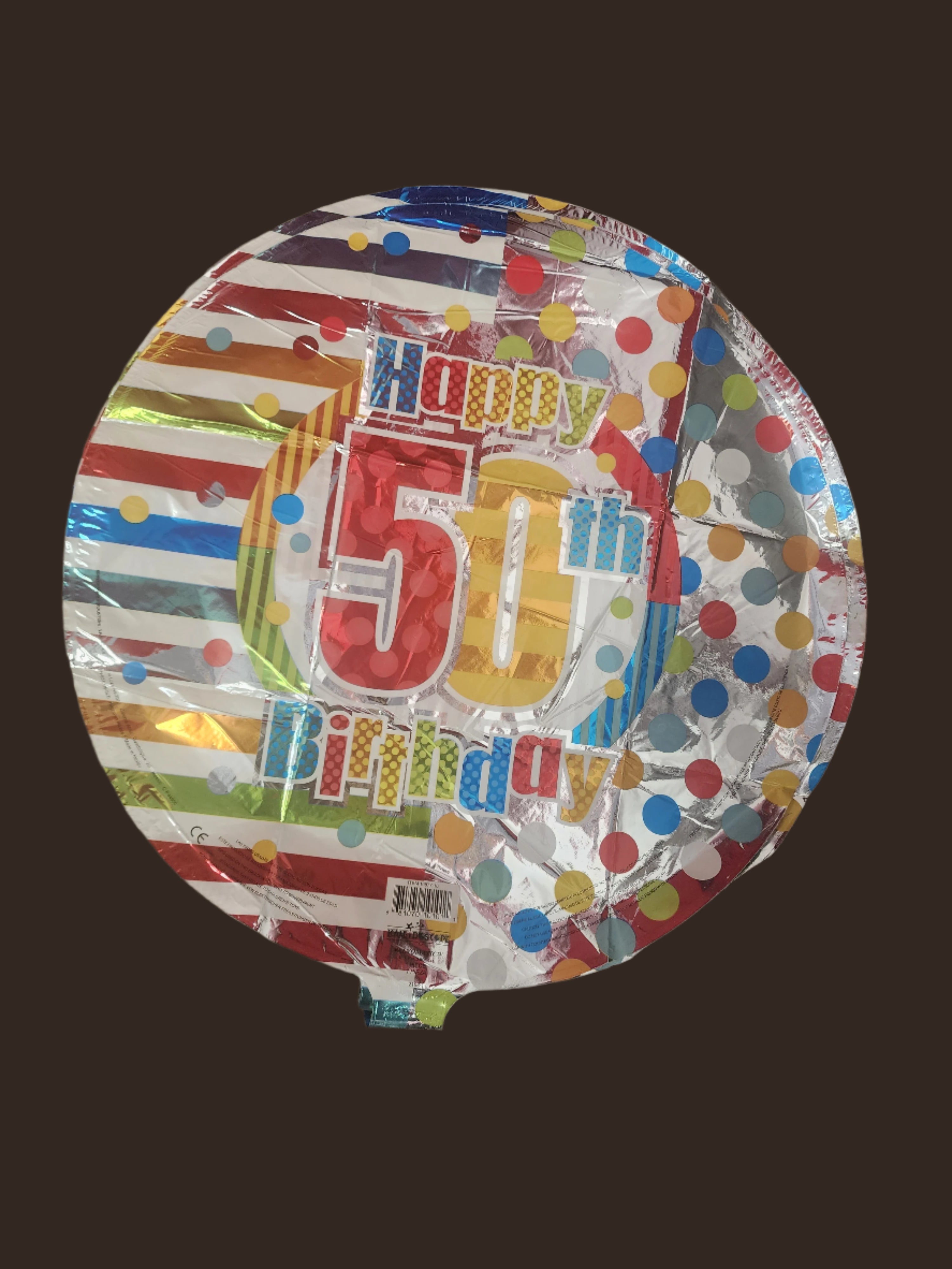Celebrate in style with this vibrant 18-inch round balloon showcasing a bold number AB50